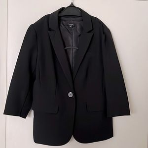 Woman’s suit jacket. Black size small